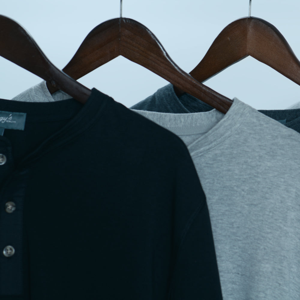Black, Gray, and Blue Henley on a hanger