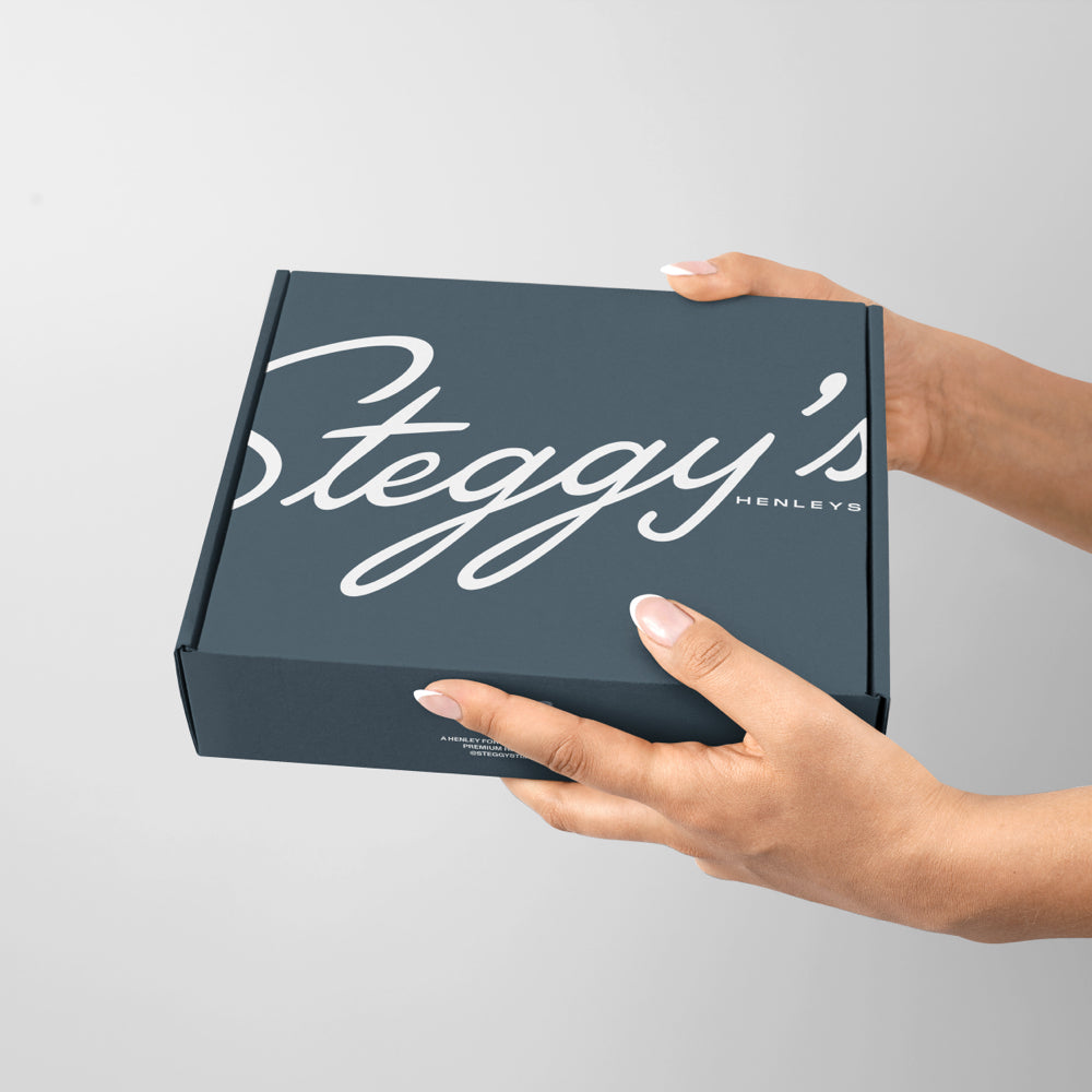 Woman holding a Steggy's box